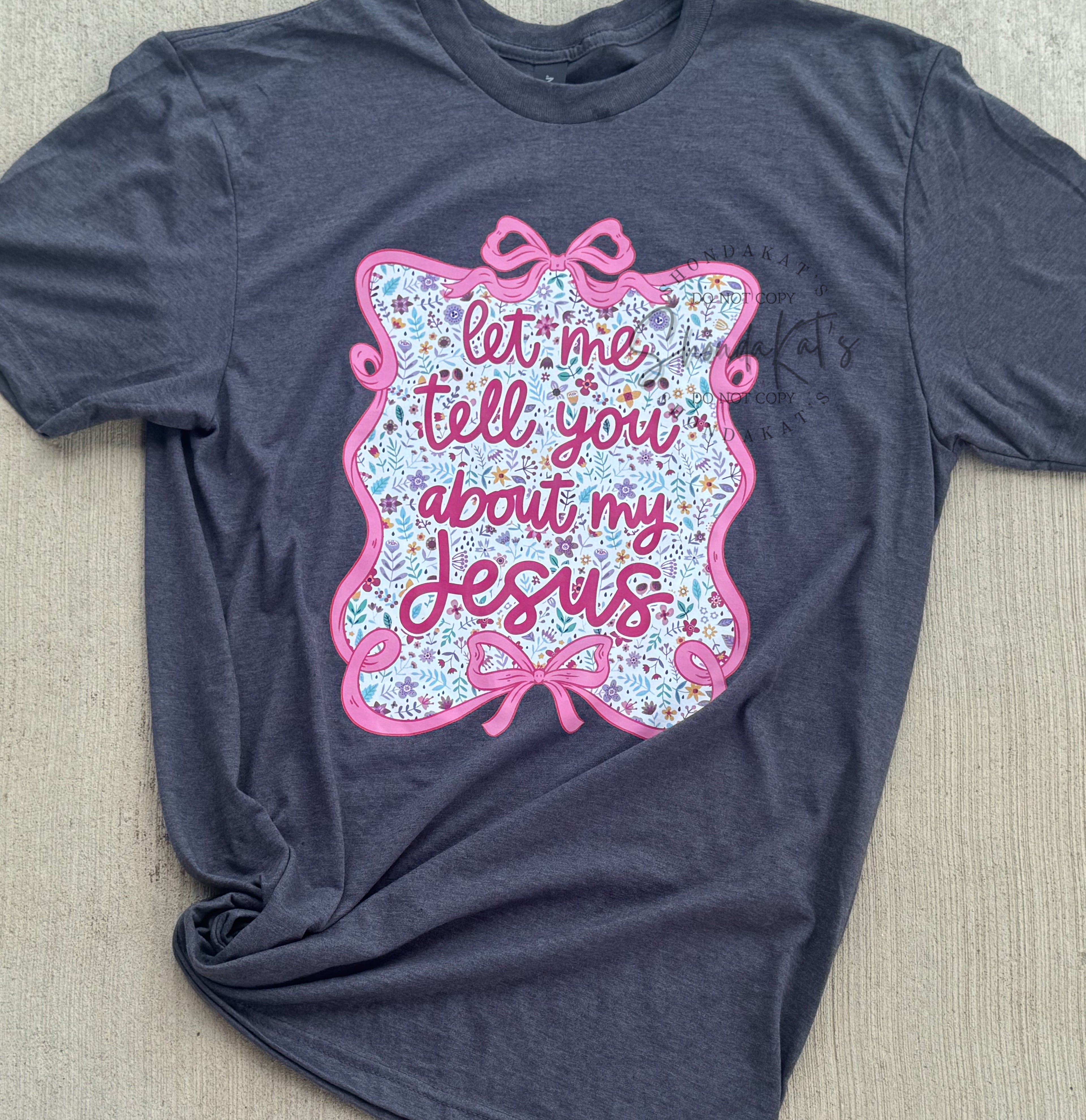 “Let Me Tell You About My Jesus” Graphic Tee